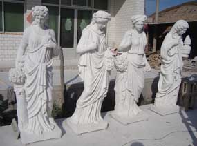 Human White Four Season Sculptures