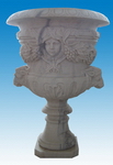 carved stone flower urns